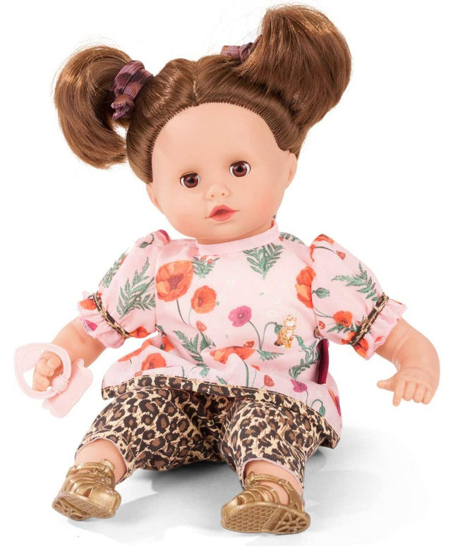 Catness Gotz Doll wearing a floral top and leopard print pants on a white background