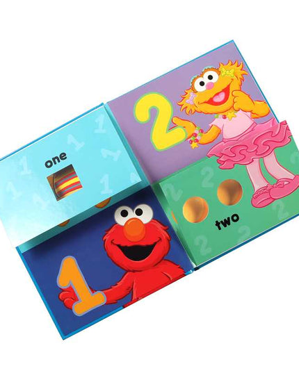 Children's book with Elmo and Abby Cadabby on a white background