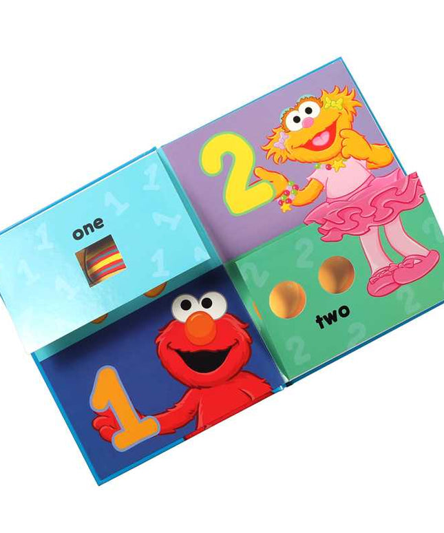 Children's book with Elmo and Abby Cadabby on a white background