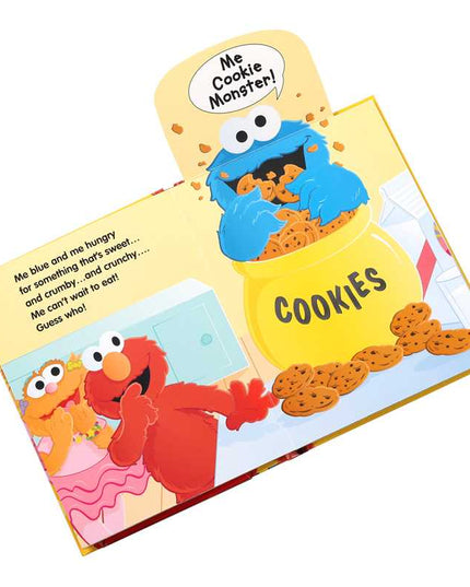 Sesame Street book with Cookie Monster and Elmo on a yellow background
