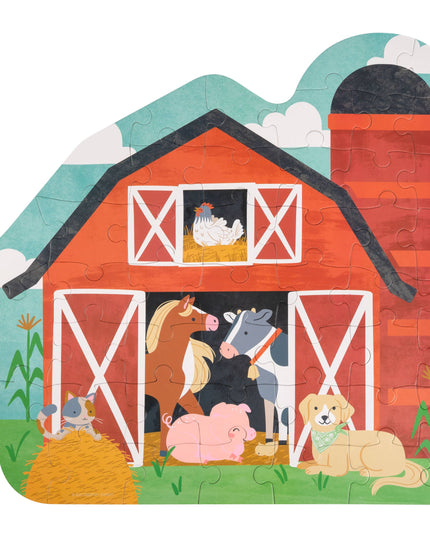 Children's puzzle with a red barn and farm animals on a white background