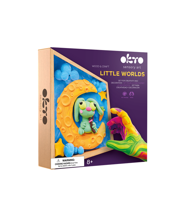 Okto Little Worlds sensory art kit packaging with colorful toy and hand holding it.