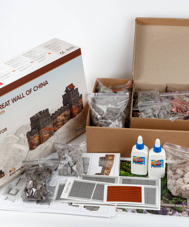 Model building kit for the Great Wall of China with packaging and components on a white background