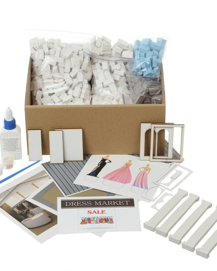 Dollhouse miniatures kit with box, accessories, and samples on a white background