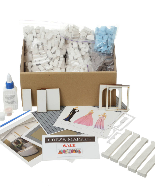 Dollhouse miniatures kit with box, accessories, and samples on a white background