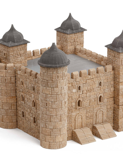 Model of a stone castle with towers on a white background