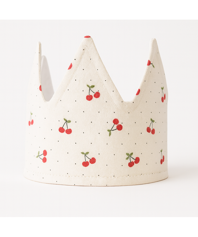 Fabric crown with cherry pattern on a white background