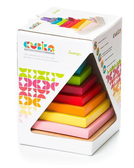 Colorful wooden stacking blocks in a Kuska box on a white background
