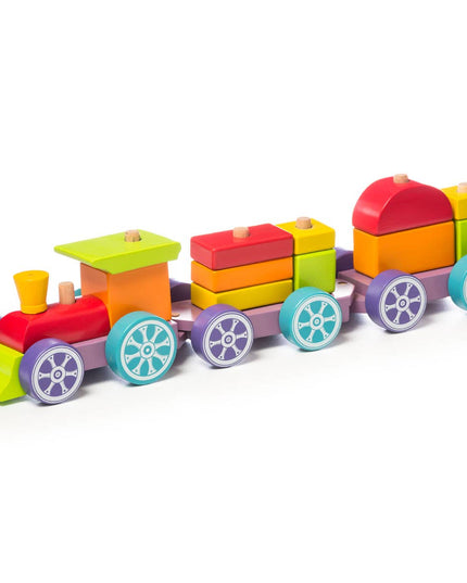 Colorful toy train made of interlocking blocks on a white background