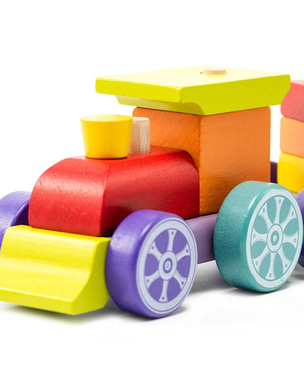 Colorful wooden toy train on a white background