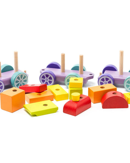 Colorful wooden block set with blocks and train-shaped bases on a white background