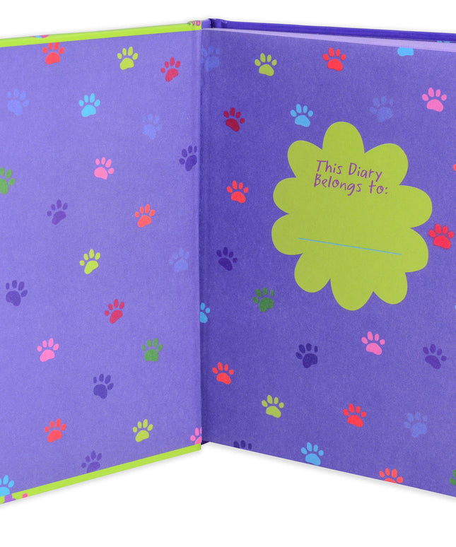 Purple diary with colorful paw prints and a green label on a white background