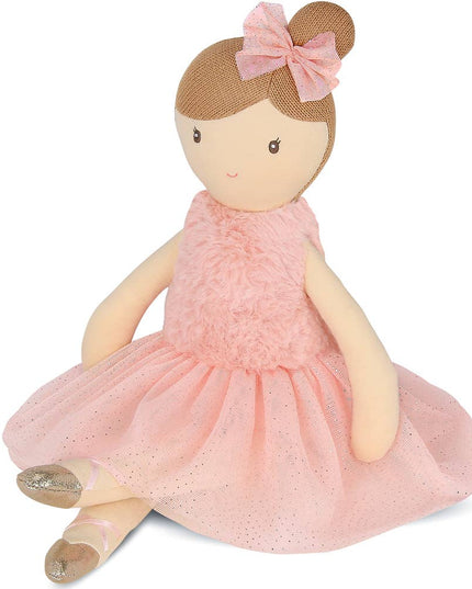 Doll in a pink dress with a bow on a white background