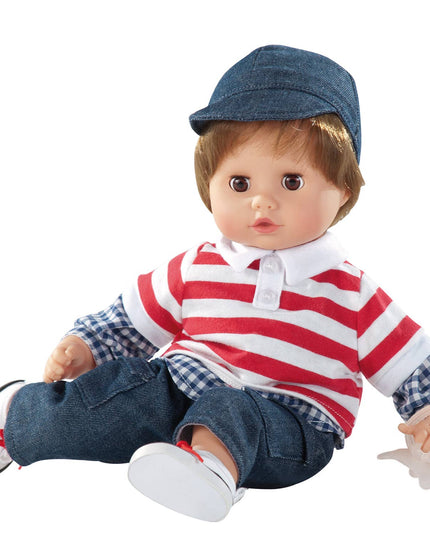 Toy doll wearing a red and white striped shirt with a blue cap and pants on a white background