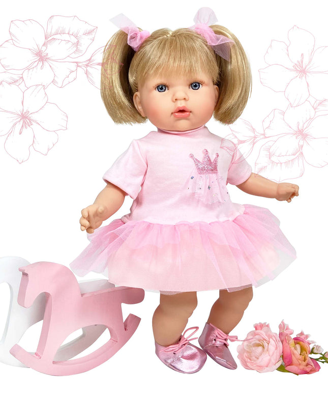 Doll in a pink dress with a rocking horse and flowers on a white background