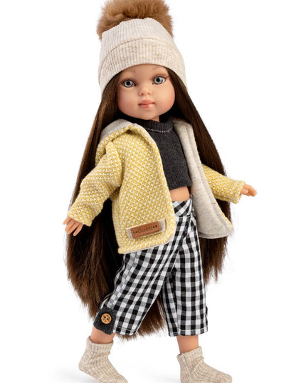 Doll wearing a yellow jacket, checkered pants, and a beige hat on a white background