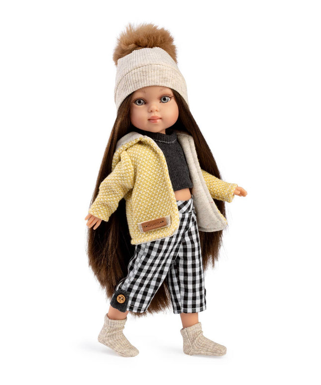 Doll wearing a yellow jacket, checkered pants, and a beige hat on a white background