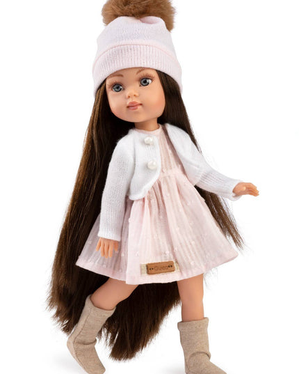 Doll with long brown hair wearing a white outfit, beige boots, and a white hat with a brown pom-pom on a white background.
