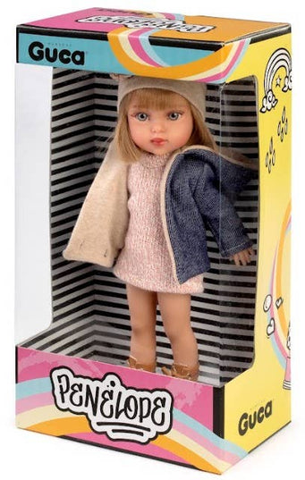 Guka doll in a colorful box with 'Penelope' branding