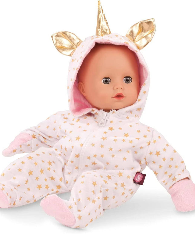 Baby doll in a unicorn costume with a white background