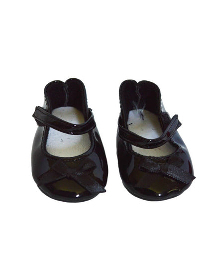 Pair of black baby shoes with open toes on a white background
