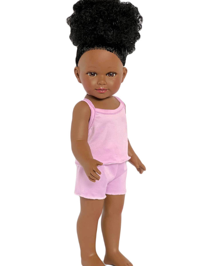 Doll with pink top and shorts on a white background