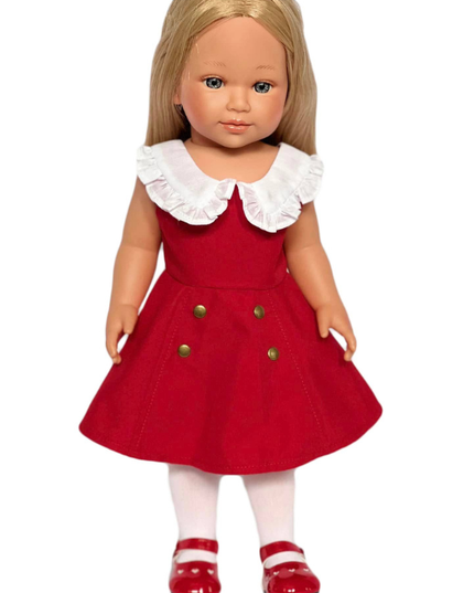 Doll wearing a red dress with a white collar on a white background