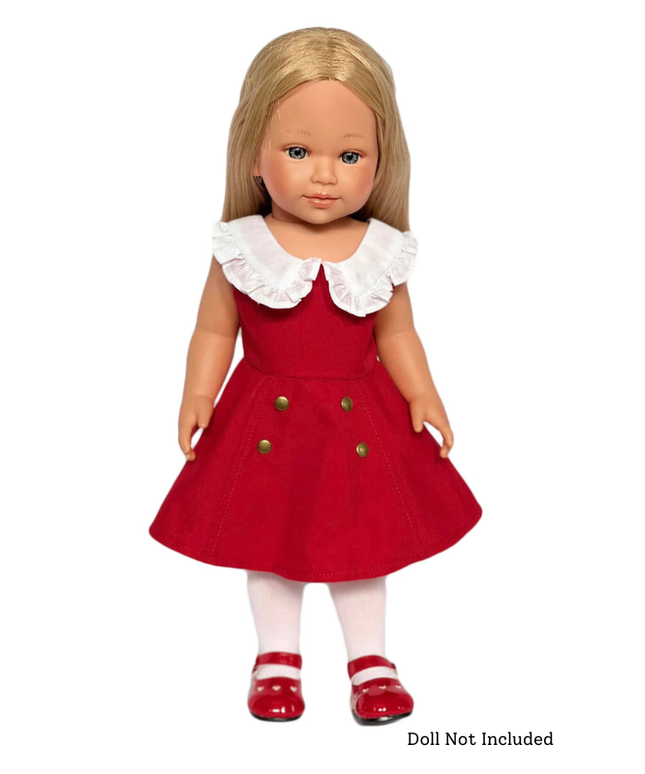 Doll wearing a red dress with a white collar on a white background