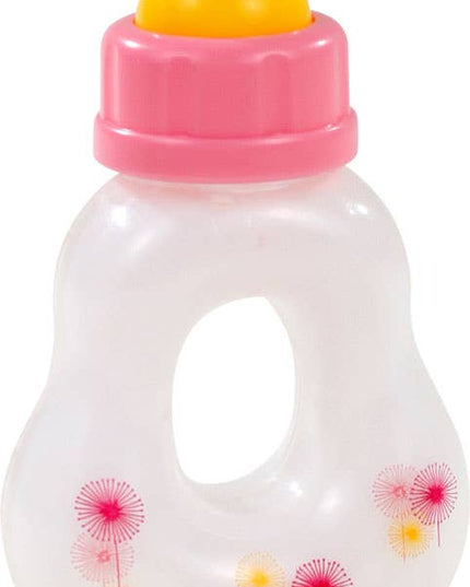 Toy bottle with pink cap and floral design on a white background