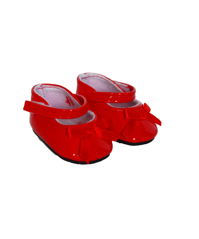 Red shoes with bows on a white background