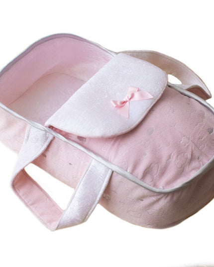 Pink baby carrier with a bow on a white background