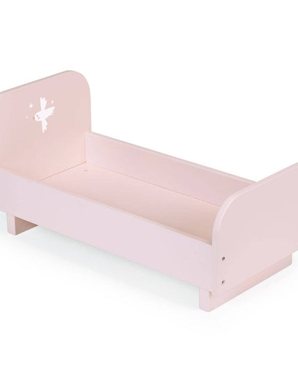 Pink children's bed with a white star design on a white background