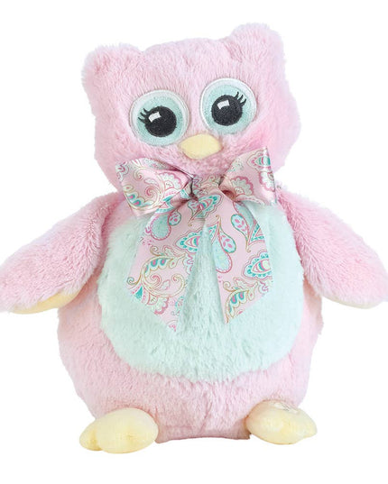Pink plush owl with a bow tie on a white background