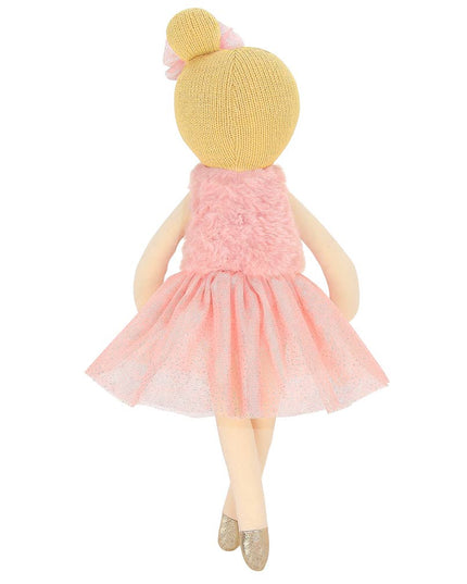 Stuffed doll with yellow knitted hat and pink dress on a white background