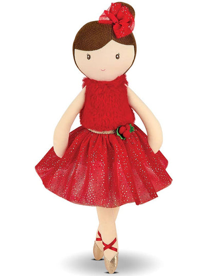 Doll in a red dress with a red flower headband on a white background