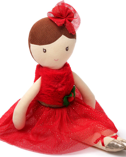Doll with a red dress and bow on a white background
