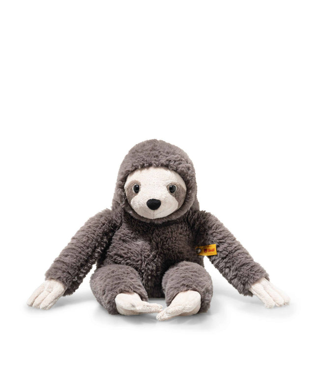 Plush toy sloth on a white background