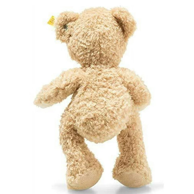 Beige teddy bear on a white background