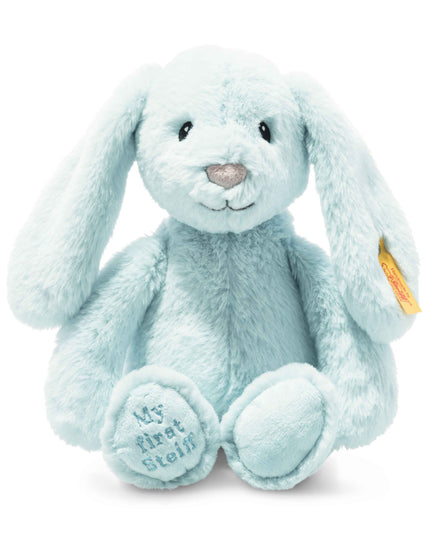 Light blue plush bunny with 'My first Steiff' text on a white background