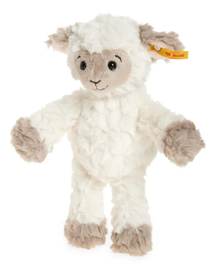 Plush toy lamb with a visible brand tag on a white background