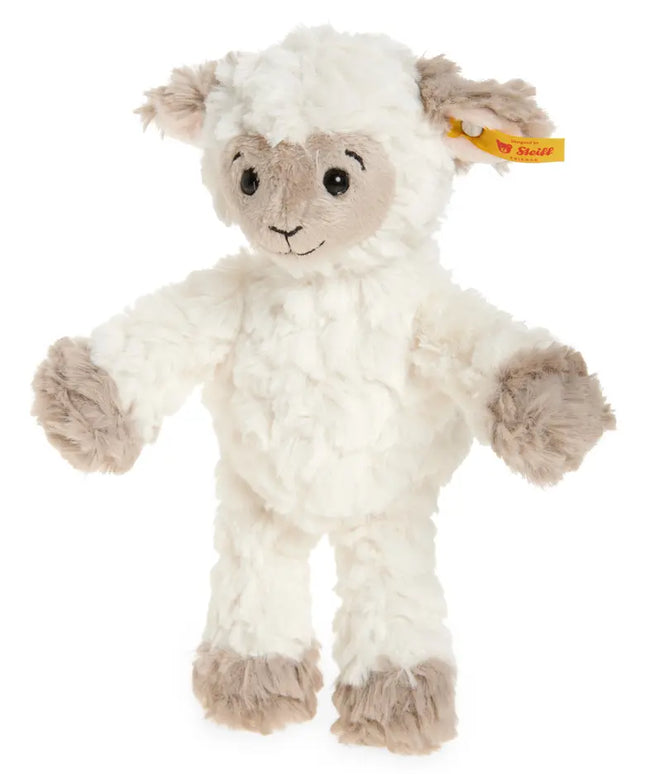 Plush toy lamb with a visible brand tag on a white background