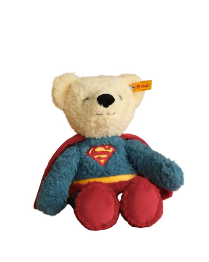 Superman-themed teddy bear with a red cape and Superman logo on a white background