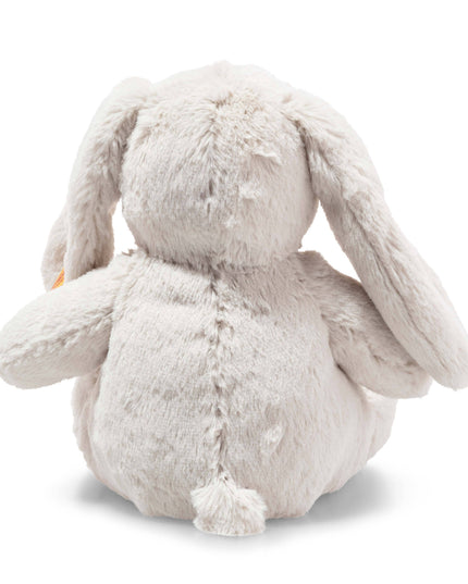 Plush bunny toy on a white background