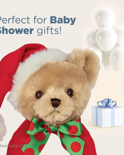 Teddy bear with a Santa hat and Christmas-themed outfit, perfect for baby shower gifts.