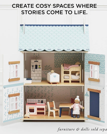 Toy dollhouse with furniture and dolls, text 'Create Cosy Spaces Where Stories Come to Life'.