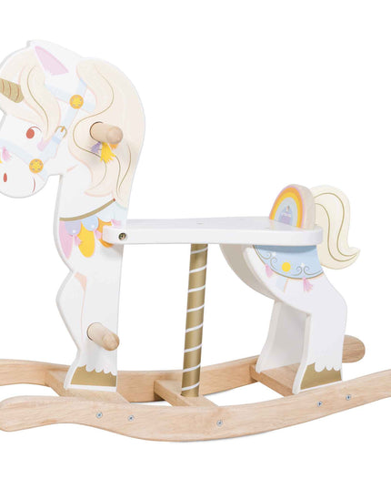 Wooden rocking horse with unicorn design on a white background