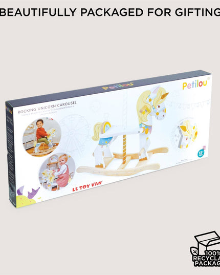 Packaged rocking unicorn carousel toy with 'Le Toy Van' branding on a beige background.