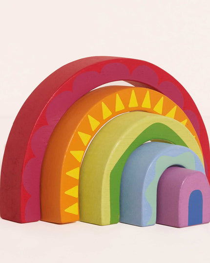 Set of colorful wooden arches on a light pink background