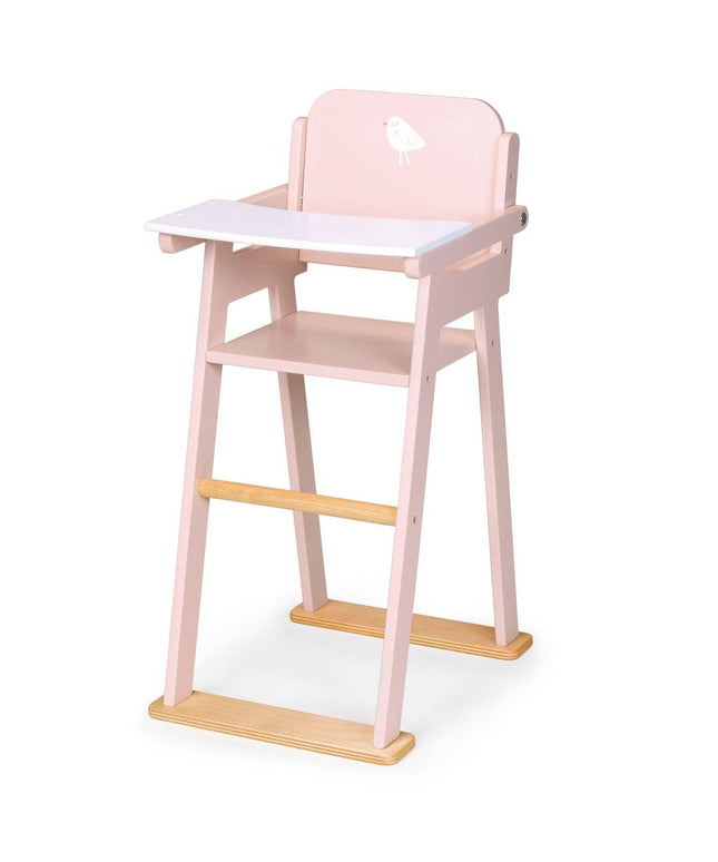 Pink and wooden high chair on a white background