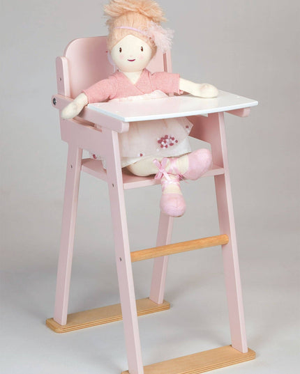 Pink high chair with a doll wearing a matching outfit on a light gray background